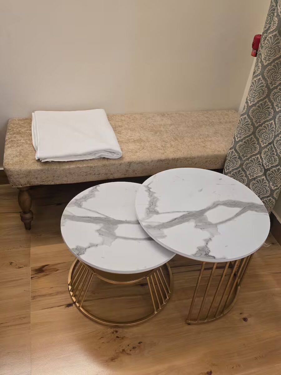 Cozy seating corner with nested marble side tables